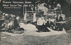 People Sitting on Rescued Household Goods from the Great Salem Fire, June 25, 1914 Postcard