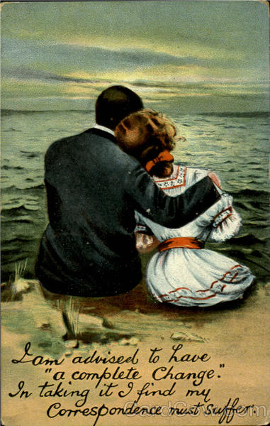 Couple watching Sunset at Beach Romance & Love