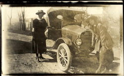 Two Women with Old Car