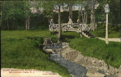 Rustic Bridge And Water Wheel