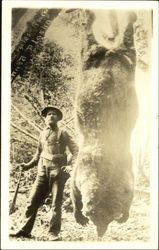 Hunter with Kodiak Bear Hunter with Kodiak Bear