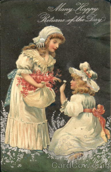 Two young girls picking flowers