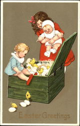 Children and baby chicks playing