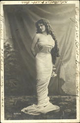 Woman draped in revealing attire Woman draped in revealing attire