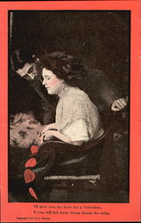 Woman in chair with man leaning over her