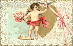 Cupid Holding Pink Flowers