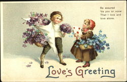 A boy & a girl exchanging flowers