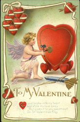 A cupid opening a heart shaped safe