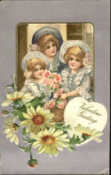 Three children, light blue hats, yellow flowers