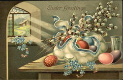 Collection of Easter eggs on a table with flowers