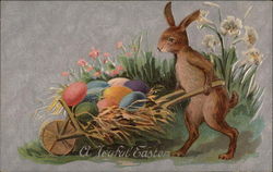 Easter bunny with wheel barrow of eggs