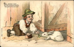Boy Feeding White Rabbit