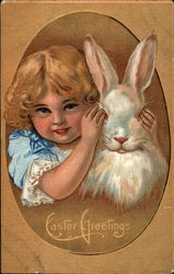 A Little Girl Playing Peekabo With A Bunny
