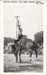 Cowboy on bucking horse, black & white photo