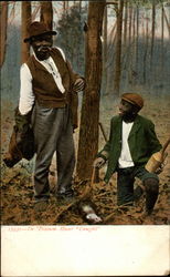 Black man and boy pose near a snared opposum