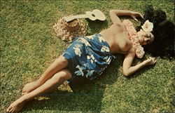 Lani rests after a strenuous Hawaiian songfest with the ukelele Lani rests after a strenuous Hawaiian songfest with the ukelele