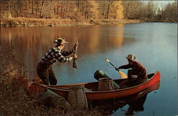 Fishermen in Canoe sighing a Deer Fishermen in Canoe sighing a Deer