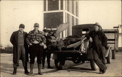 Four Men With Dead Moose in the Back of a Truck Four Men With Dead Moose in the Back of a Truck