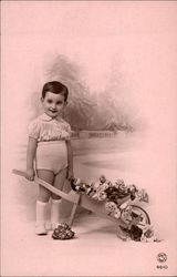 Little Boy with Cart of Flowers Little Boy with Cart of Flowers