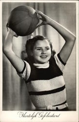 Young Girl Holding A Ball Young Girl Holding A Ball