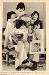 The Dionne Quintuplets with Dr. Dafoe at Callander The Dionne Quintuplets with Dr. Dafoe at Callander