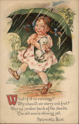 Girl in Flowered Dress Holding a Cat and Green Umbrella Girl in Flowered Dress Holding a Cat and Green Umbrella