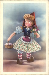 Little Dutch Girl Holding Basket and Bouquet of Flowers Little Dutch Girl Holding Basket and Bouquet of Flowers