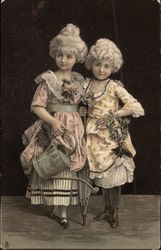 Young Girls in Victorian Attire Young Girls in Victorian Attire