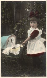 Young Girl Pushing Doll Carriage Young Girl Pushing Doll Carriage