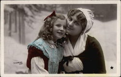 Photograph of Woman and Girl in the Snow Photograph of Woman and Girl in the Snow