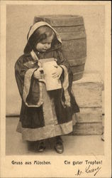 Little German Girl Holding Tankard in front of Barrel Little German Girl Holding Tankard in front of Barrel