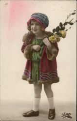 Young Girl in Coat & Hat holding Yellow Flowers Young Girl in Coat & Hat holding Yellow Flowers