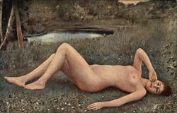 Nude Woman Lying in the Grass by a Pond Nude Woman Lying in the Grass by a Pond