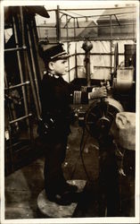 Boy in Uniform at Helm of Baot Boy in Uniform at Helm of Baot