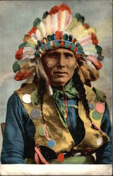 Native American Man in Feathered Headdress Native American Man in Feathered Headdress