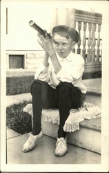 School Boy on the Porch Steps with a Spyglass School Boy on the Porch Steps with a Spyglass