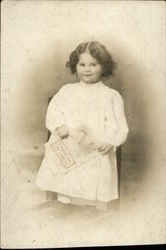 Portrait of Little Girl Holding Book Portrait of Little Girl Holding Book
