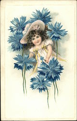 Little Girl in Big Bonnet Surrounded by Large Blue Flowers Little Girl in Big Bonnet Surrounded by Large Blue Flowers