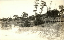 Homes Built on Ridge Above Beach Postcard