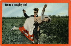 Woman being Spanked by Man in Field Woman being Spanked by Man in Field