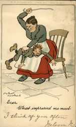 Boy being caned on Mother's Lap Boy being caned on Mother's Lap