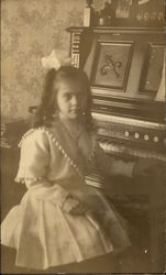 Girl Sitting at Organ Girl Sitting at Organ