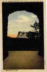 Mt. Rushmore Memorial from Tunnel on Iron Mountain Road Postcard