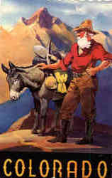 Early day prospector and his faithful burro Postcard