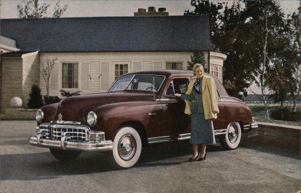 Woman Standing By Brown Frazer Manhattan Cars