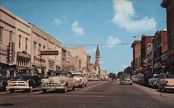 Down town business section - daytime photo of Patterson street Postcard