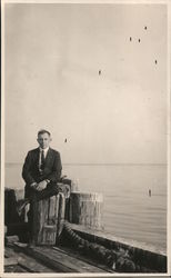 Man Sitting on Warf in Santa Barbara, CA Postcard
