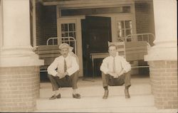 Two Men Sitting on Steps of Infirmary Postcard