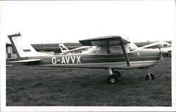 Small Plane in Field Postcard