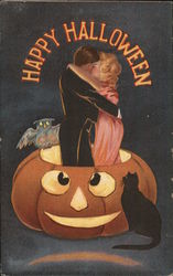Happy Halloween - A Couple Inside A Pumpkin Postcard